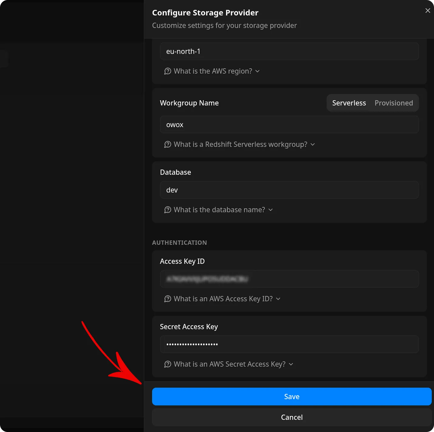 OWOX Data Marts Configure Storage Provider dialog displaying the final configuration form. The form shows the region field set to eu-north-1, Workgroup Name field containing owox with Serverless and Provisioned tabs, Database field showing dev, and Authentication section with Access Key ID and Secret Access Key fields. A prominent blue Save button with a red arrow pointing to it is centered at the bottom of the dialog, alongside a Cancel button. The dialog has a dark background with professional layout and informational help icons throughout.